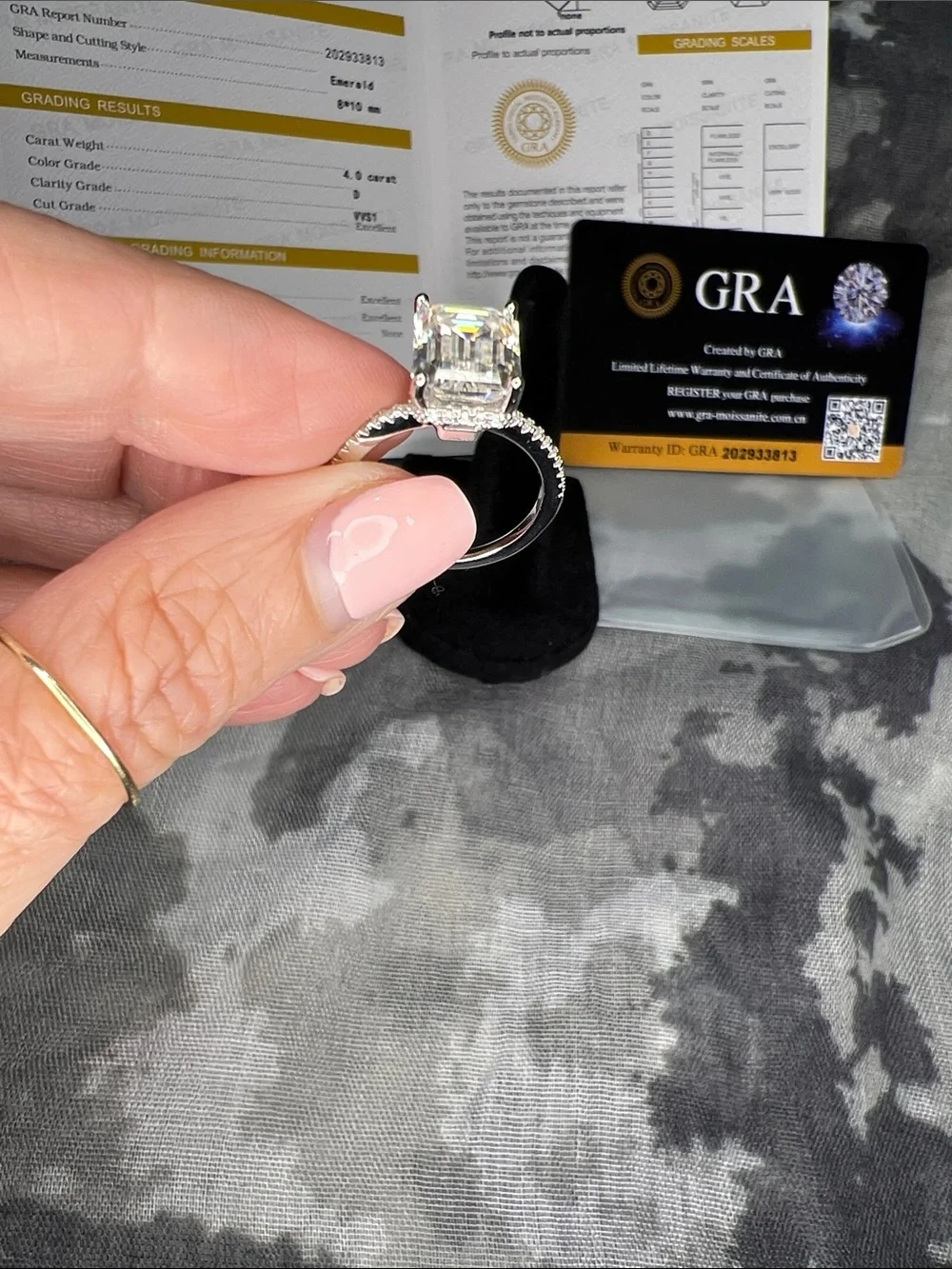 GRA 4ct Emerald Cut Moissanite Ring in Sparkling White